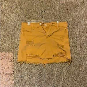 Yellow denim mini skirt